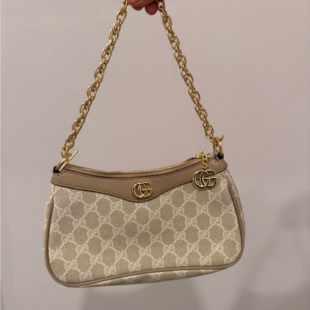 Elegant Beige Designer Shoulder Bag with Gold Accents